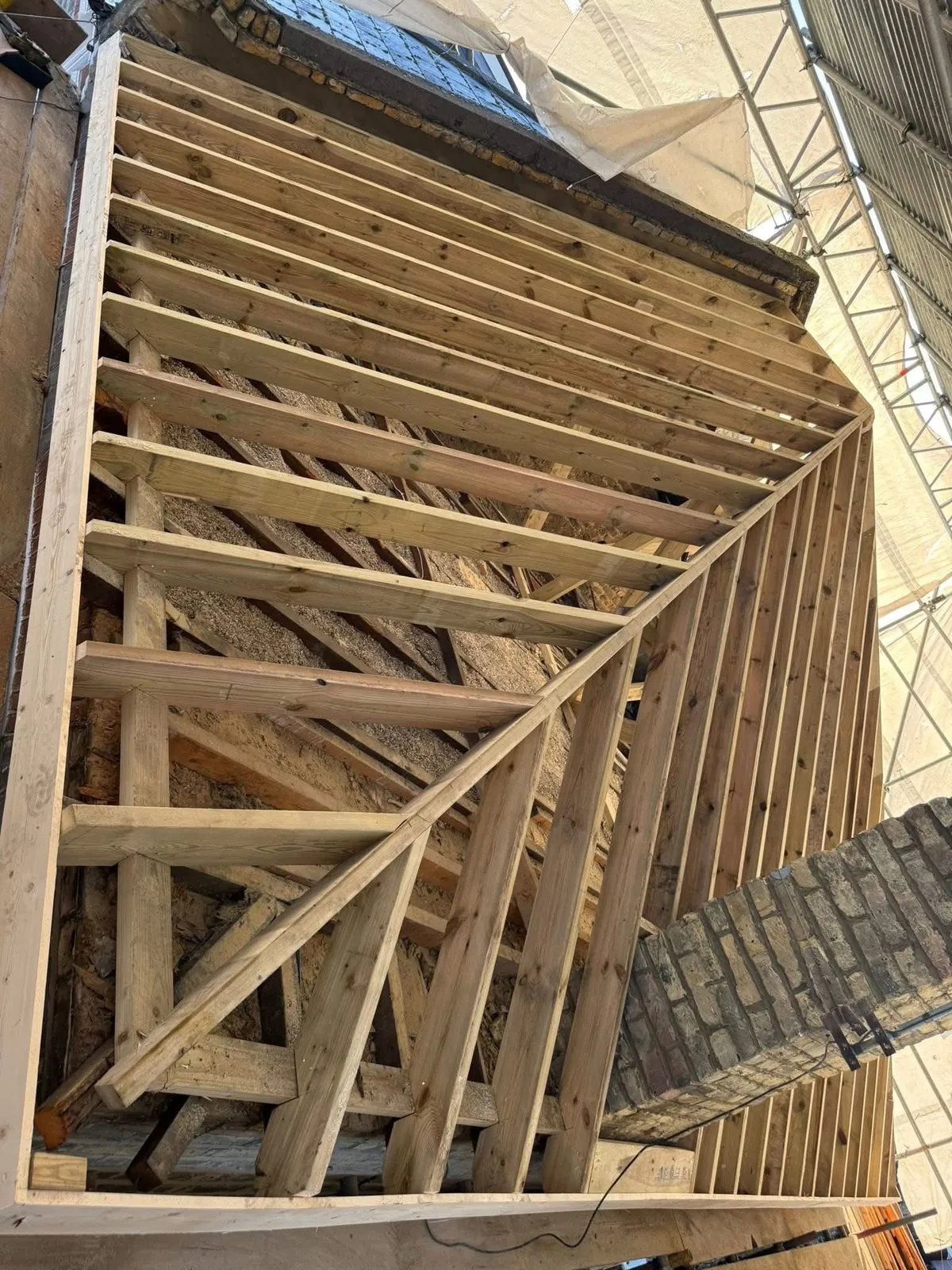 New roof timbers and rafters during a re-roof in Seaton