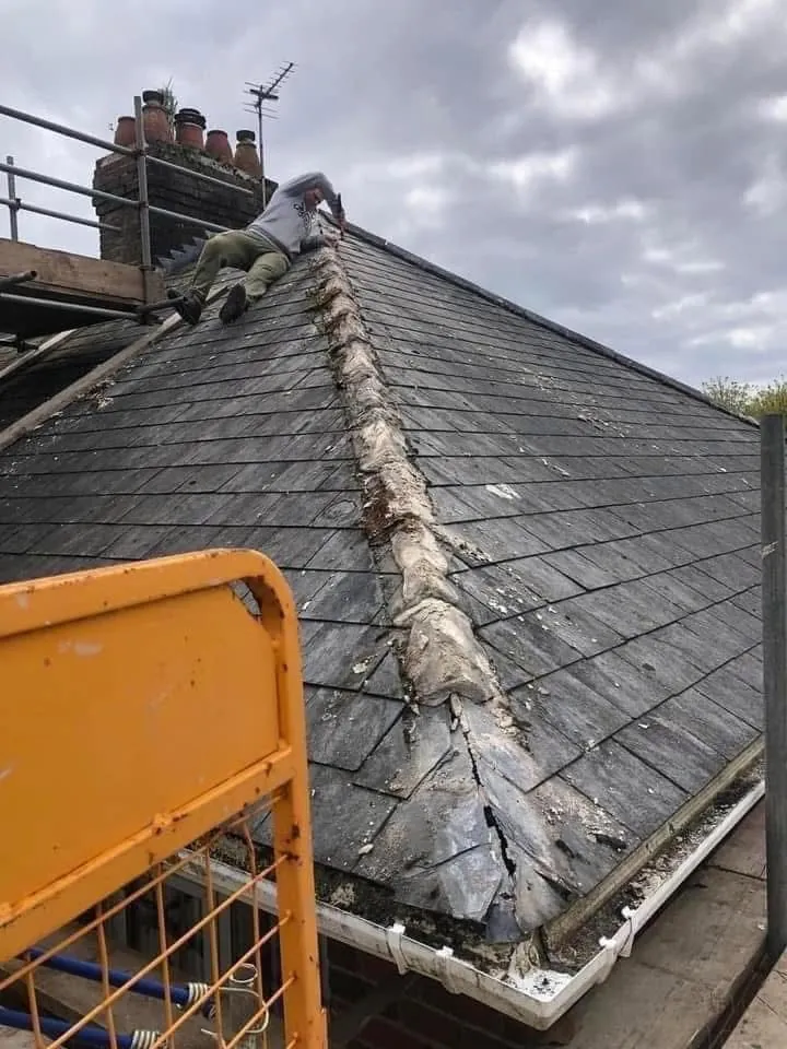 Slate roof ridge and chimney repair in Seaton